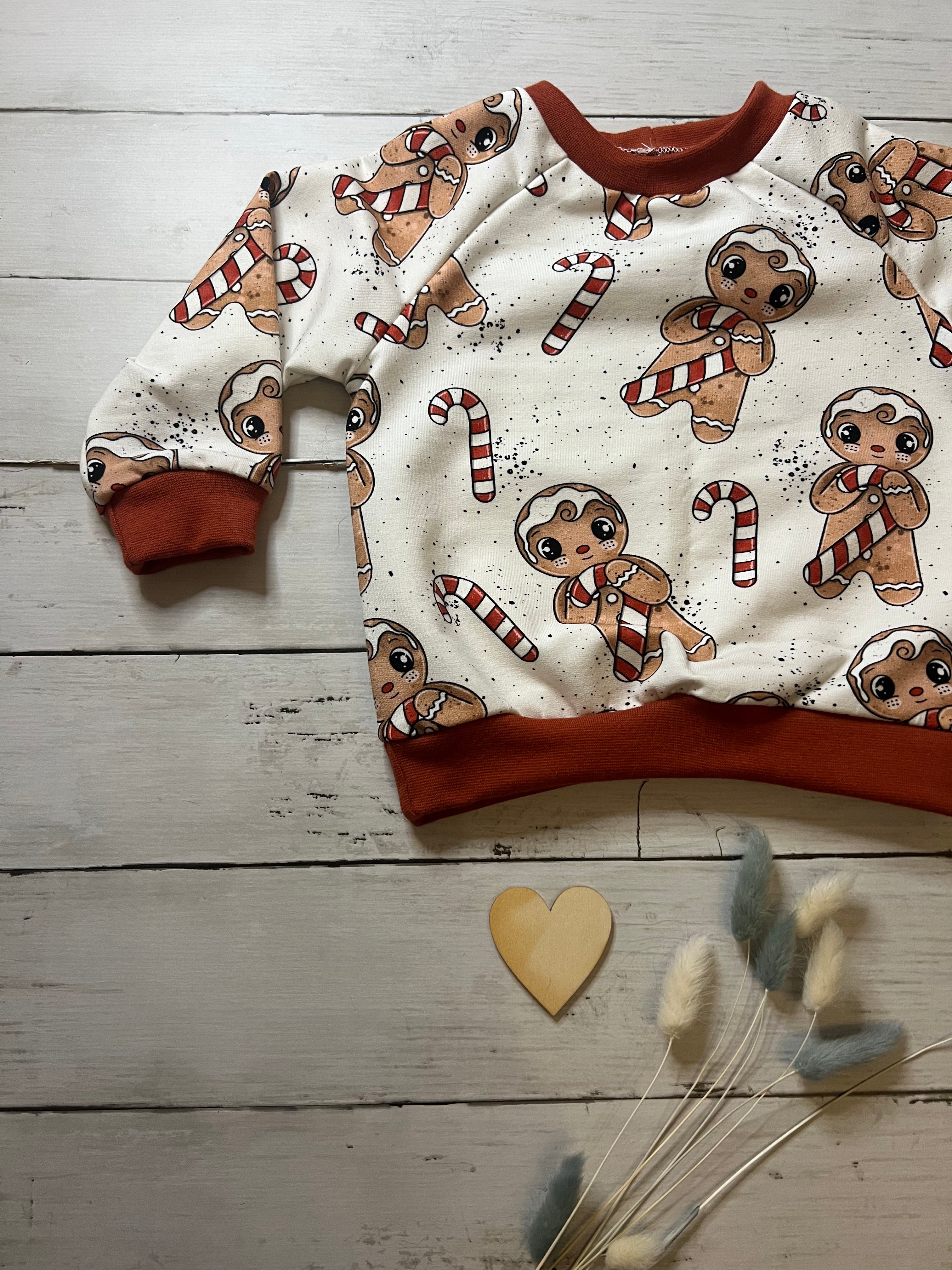 Zauberhafter Lebkuchen Pullover Gr. 80